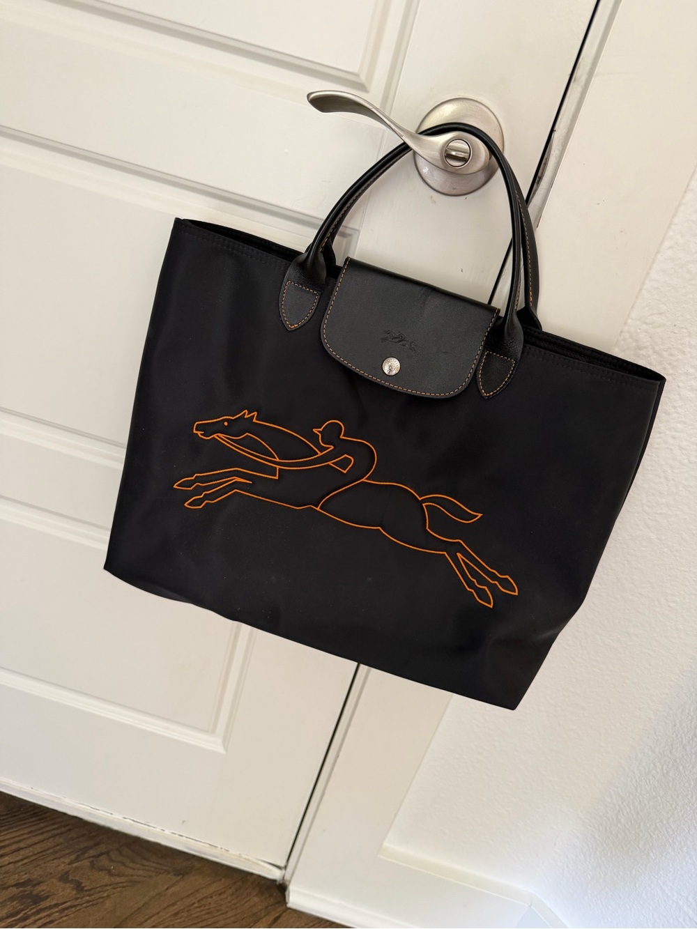 Longchamp Black Top handle tote with Orange Horse Motif logo